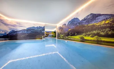 Der Swimmingpool an oder in der Nähe von Wellness- und Familienhotel Garni Dachsteinresort