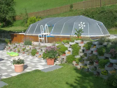 Ein Garten an der Unterkunft Pension Hochkönigblick