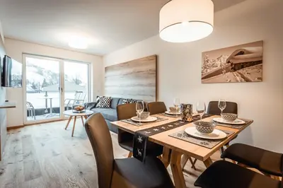 Ein Sitzbereich in der Unterkunft Apartments Gustav by Schladming-Appartements