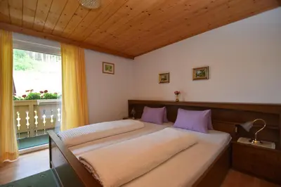Ein Bett oder Betten in einem Zimmer der Unterkunft Haus Amadeus