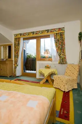 Ein Bett oder Betten in einem Zimmer der Unterkunft Haus Alpenglühn