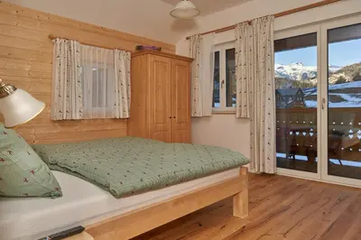 Ein Bett oder Betten in einem Zimmer der Unterkunft Ausseer Chalet (nahe Hallstatt), Appartements