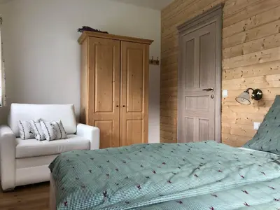 Ein Bett oder Betten in einem Zimmer der Unterkunft Ausseer Chalet (nahe Hallstatt), Appartements