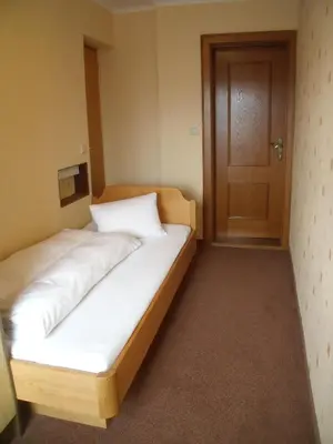 Ein Bett oder Betten in einem Zimmer der Unterkunft Gasthof Edelbrunn