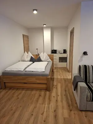 Ein Bett oder Betten in einem Zimmer der Unterkunft Appartement Etschbacher