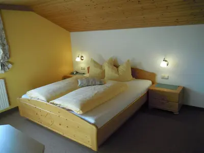 Ein Bett oder Betten in einem Zimmer der Unterkunft Ferienhaus Höchhäusl