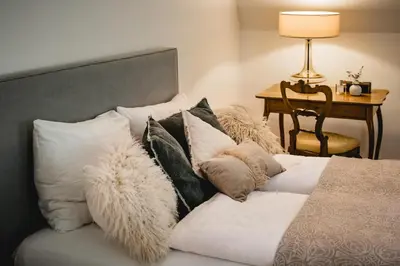 Ein Bett oder Betten in einem Zimmer der Unterkunft Waldach Villa