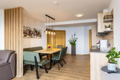 Ein Sitzbereich in der Unterkunft Haus Silvia