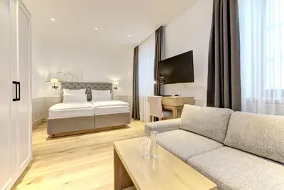 Ein Bett oder Betten in einem Zimmer der Unterkunft Hotel Gasthof König