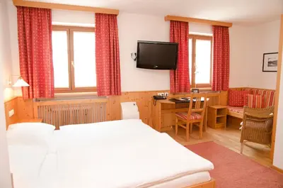 Ein Bett oder Betten in einem Zimmer der Unterkunft Hotel Gasthof König