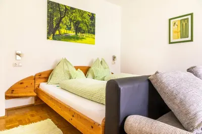 Ein Bett oder Betten in einem Zimmer der Unterkunft Hinterkellaubauer