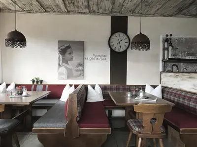Ein Sitzbereich in der Unterkunft Pension Spreitzhof & Appartement Royer