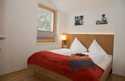 Ein Bett oder Betten in einem Zimmer der Unterkunft Sportappartements