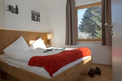 Ein Bett oder Betten in einem Zimmer der Unterkunft Sportappartements