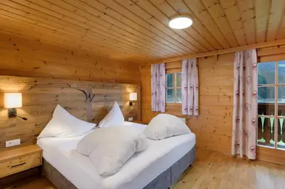Ein Bett oder Betten in einem Zimmer der Unterkunft Walchauhof