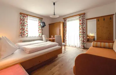 Ein Bett oder Betten in einem Zimmer der Unterkunft Pension Walchauhof