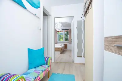 Ein Bett oder Betten in einem Zimmer der Unterkunft Schnelli Appartement Schladming