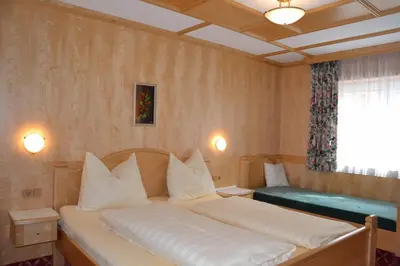 Ein Bett oder Betten in einem Zimmer der Unterkunft Ferienwohnungen Walcher