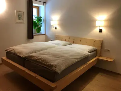 Ein Bett oder Betten in einem Zimmer der Unterkunft Haus Ramsauer