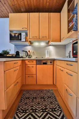 Küche/Küchenzeile in der Unterkunft Winzig Apartment