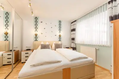 Ein Bett oder Betten in einem Zimmer der Unterkunft Ferienwohnung Ulli by Schladming-Appartements
