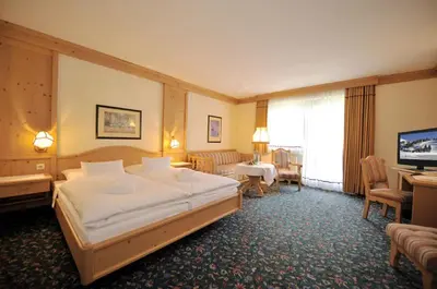 Ein Bett oder Betten in einem Zimmer der Unterkunft Hotel Koch
