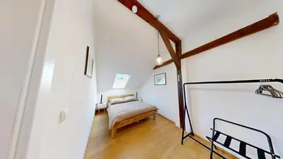 Ein Bett oder Betten in einem Zimmer der Unterkunft Marktplatz Traunsee LAKE View