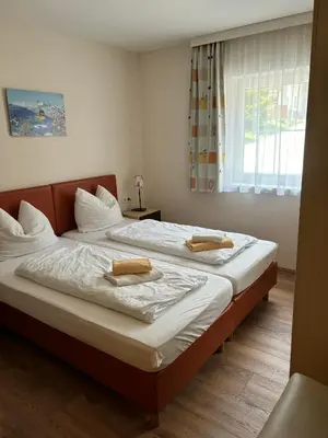 Ein Bett oder Betten in einem Zimmer der Unterkunft Eckenhof