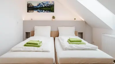 Ein Bett oder Betten in einem Zimmer der Unterkunft Moderne Ferienwohnung mit Bergblick