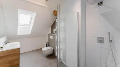 Ein Badezimmer in der Unterkunft Moderne Ferienwohnung mit Bergblick