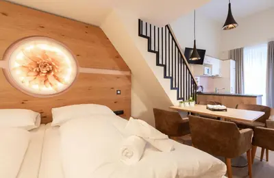Ein Bett oder Betten in einem Zimmer der Unterkunft ''die Bergerin'' | Appartements Schladming