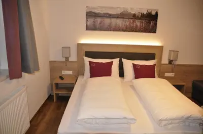 Ein Bett oder Betten in einem Zimmer der Unterkunft Herzis Appartements