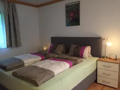 Ein Bett oder Betten in einem Zimmer der Unterkunft Ferienwohnungen Bianca Hasler - Stallbauer