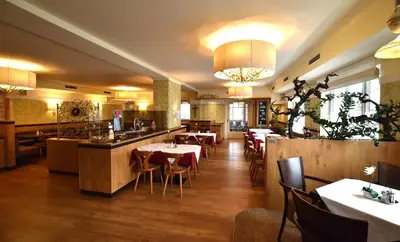 Ein Restaurant oder anderes Speiselokal in der Unterkunft Hotel&Wirtshaus Sonne