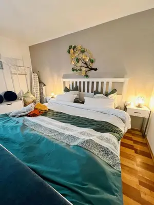 Ein Bett oder Betten in einem Zimmer der Unterkunft Gemütlicher Raum, Gampern