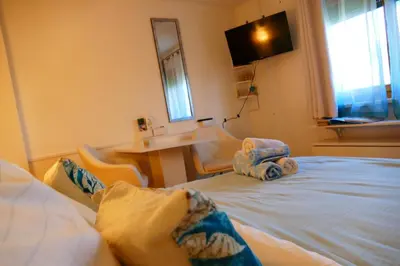 Ein Bett oder Betten in einem Zimmer der Unterkunft Gemütlicher Raum, Gampern