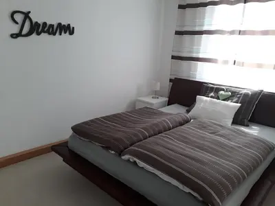 Ein Bett oder Betten in einem Zimmer der Unterkunft Svarovsky