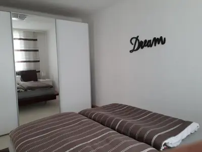 Ein Bett oder Betten in einem Zimmer der Unterkunft Svarovsky