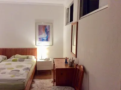 Ein Bett oder Betten in einem Zimmer der Unterkunft Appartement Planaiblick