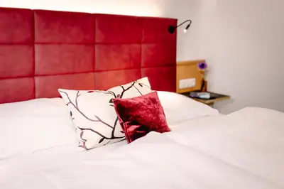 Ein Bett oder Betten in einem Zimmer der Unterkunft Hotel - Restaurant Goisererhof 3S