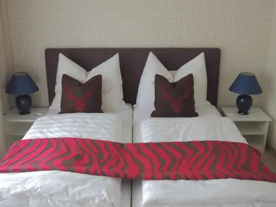 Ein Bett oder Betten in einem Zimmer der Unterkunft Appartements Basti
