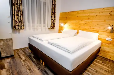 Ein Bett oder Betten in einem Zimmer der Unterkunft Fischer Ferienhaus