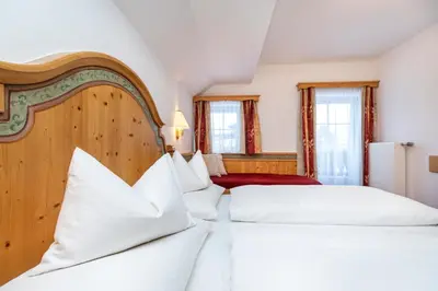 Ein Bett oder Betten in einem Zimmer der Unterkunft Frühstückspension Klinglhub
