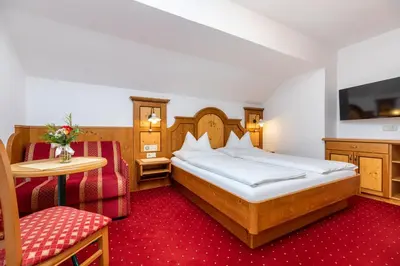 Ein Bett oder Betten in einem Zimmer der Unterkunft Frühstückspension Klinglhub