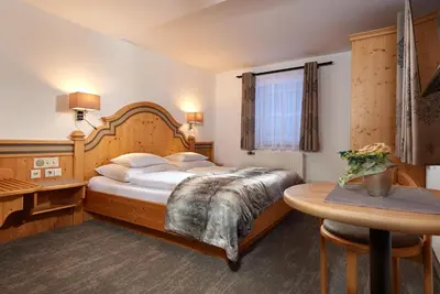 Ein Bett oder Betten in einem Zimmer der Unterkunft Frühstückspension Klinglhub