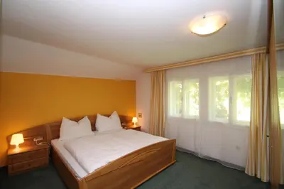 Ein Bett oder Betten in einem Zimmer der Unterkunft Appartements Reiterhaus