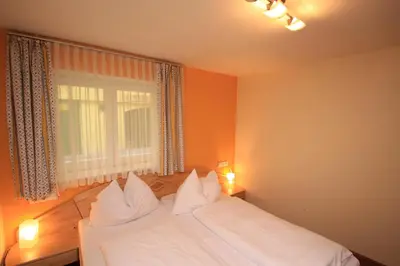 Ein Bett oder Betten in einem Zimmer der Unterkunft Appartements Reiterhaus
