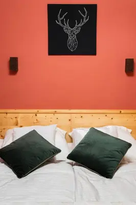 Ein Bett oder Betten in einem Zimmer der Unterkunft Ski in - Ski out Schladming NEM Alpin Chalet
