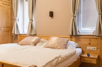 Ein Bett oder Betten in einem Zimmer der Unterkunft Ski in - Ski out Schladming NEM Alpin Chalet