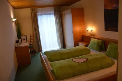 Ein Bett oder Betten in einem Zimmer der Unterkunft Haus Frey